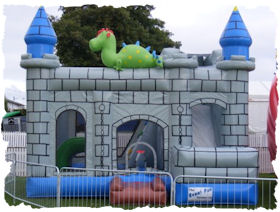 dino bouncy castle slide