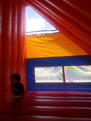 shaded internal bounce house within supa-slide